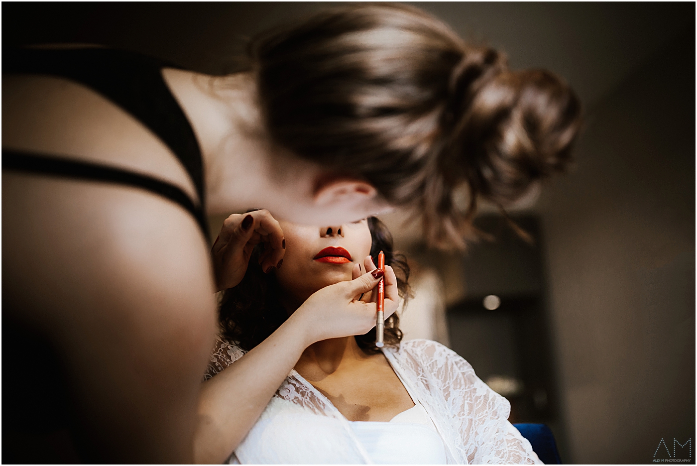 persian bride having lipstick applied