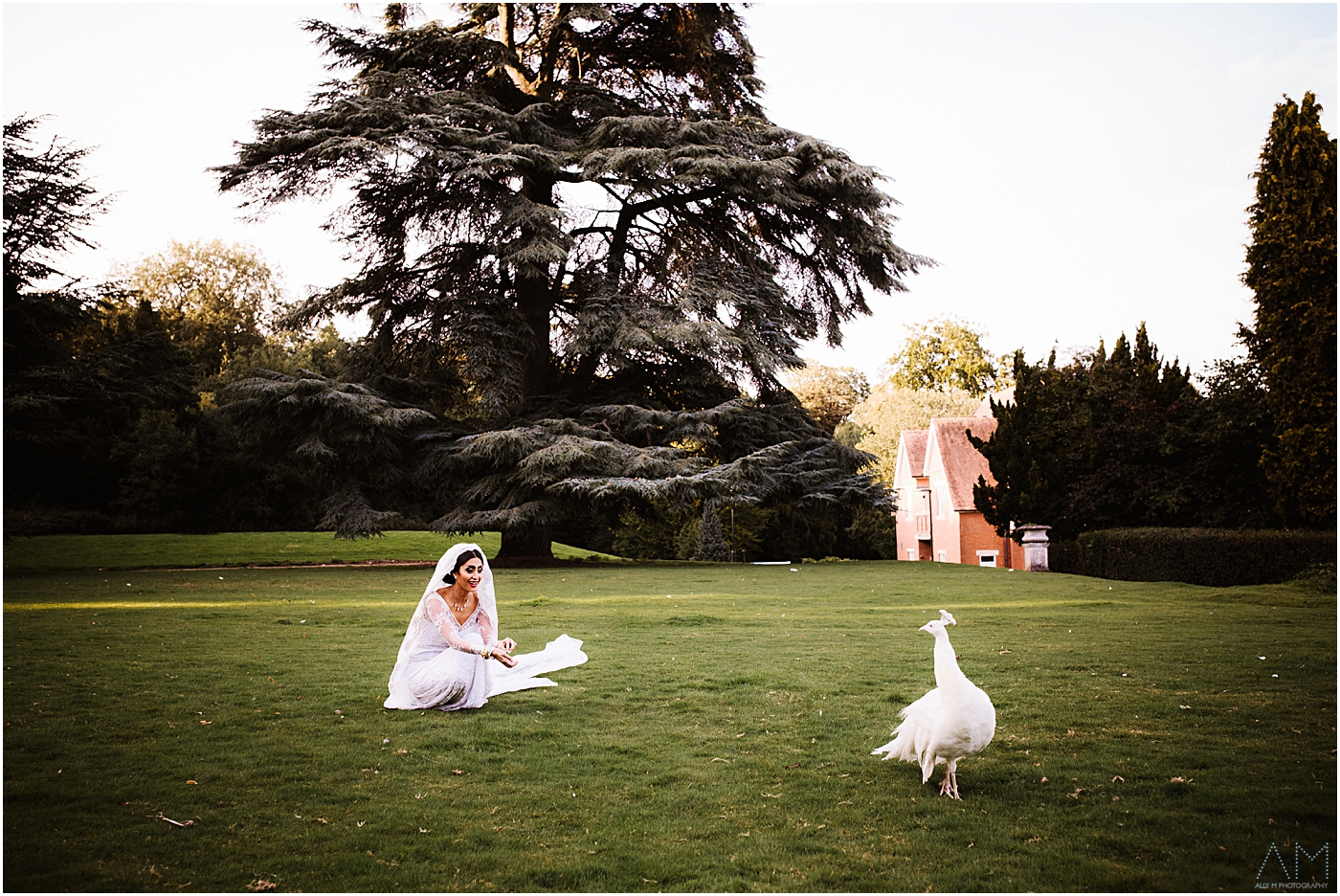 bride with peacock at pendley manor