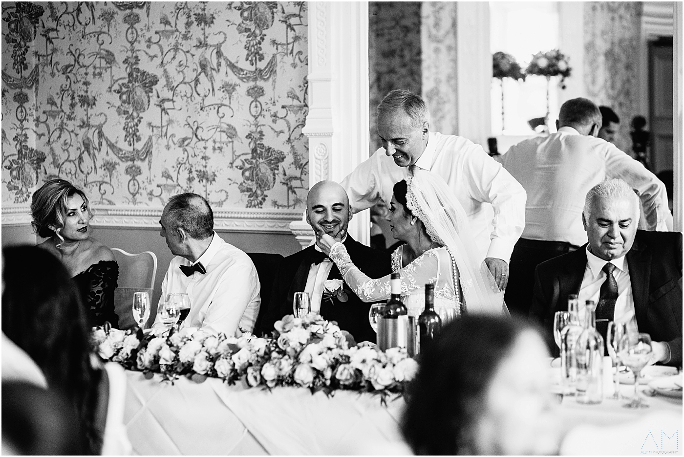 bride and groom during wedding speeches