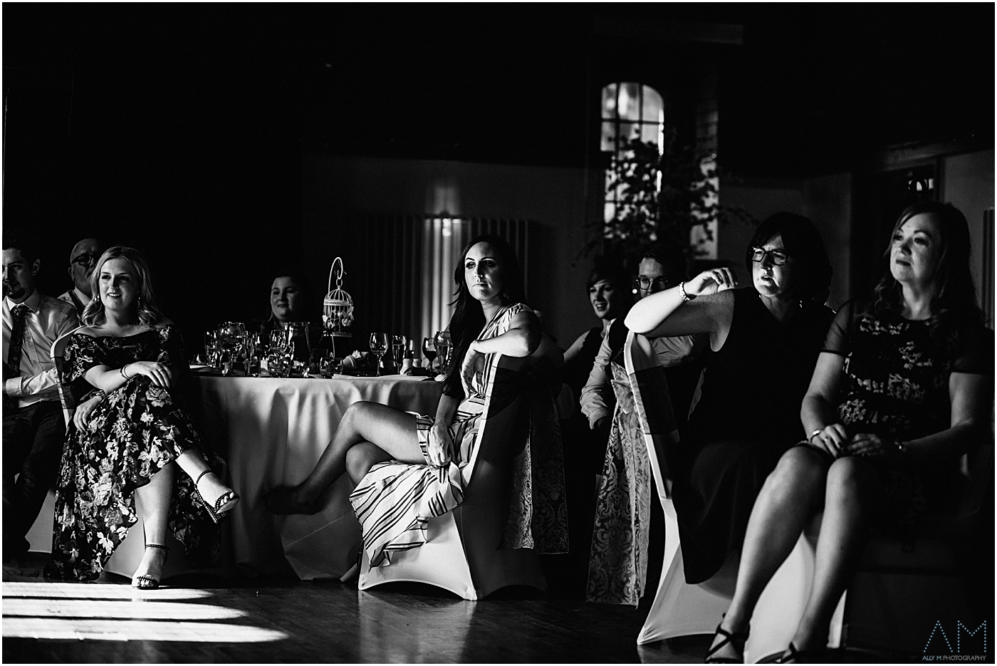 Family friends during wedding speeches