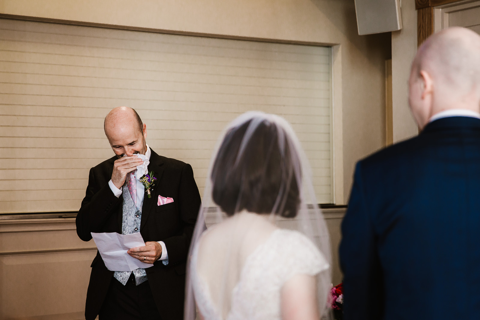 Emotinal reading by the father of the groom