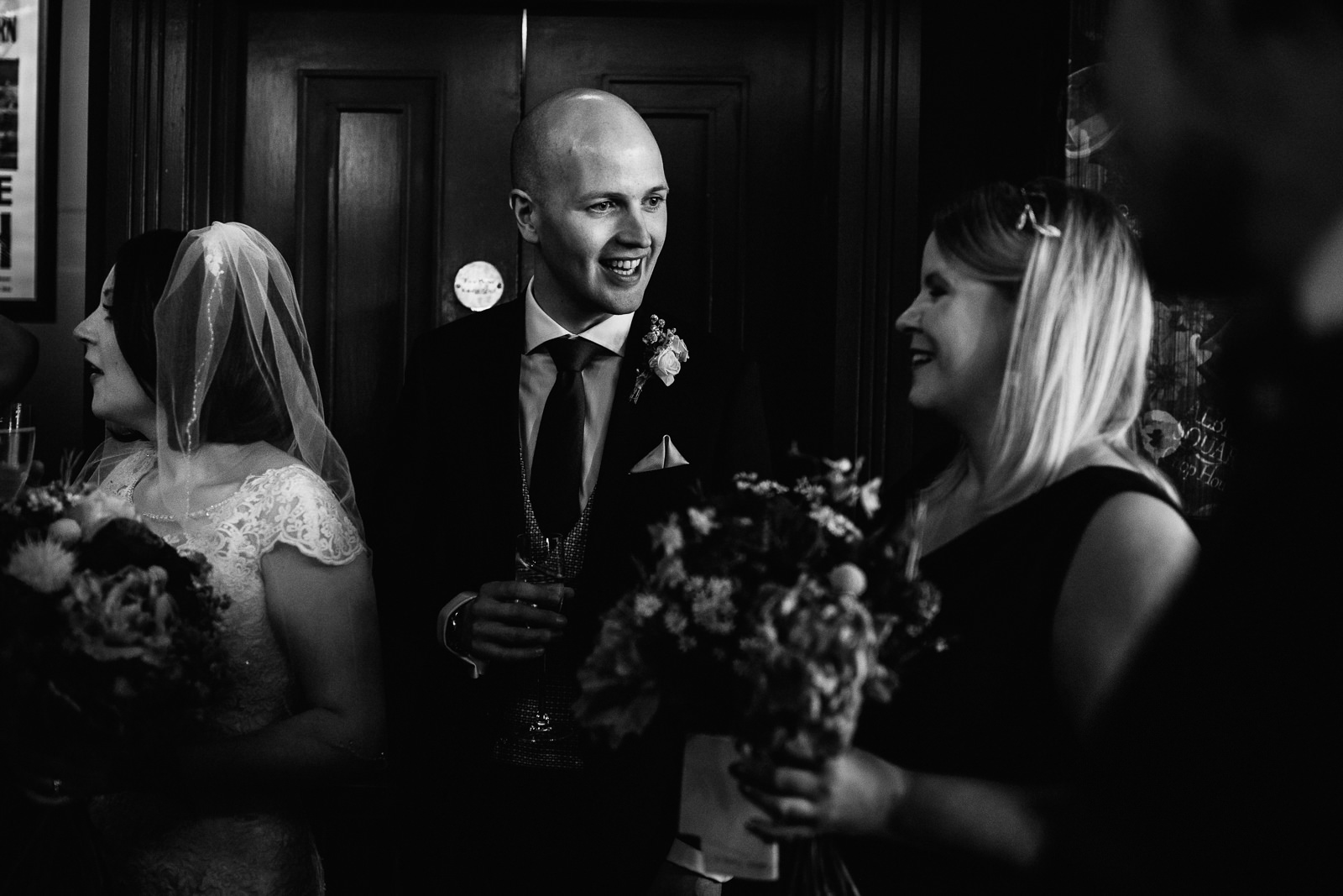 Groom happy with guests