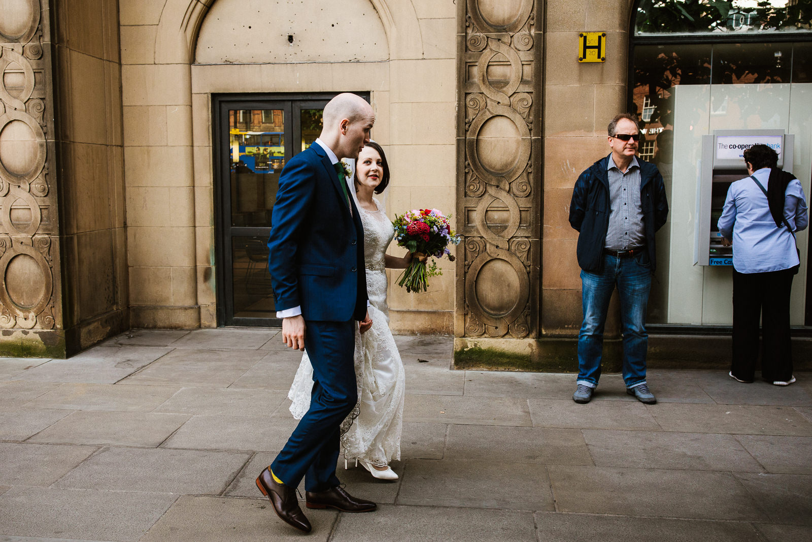 Bride and groom with locals