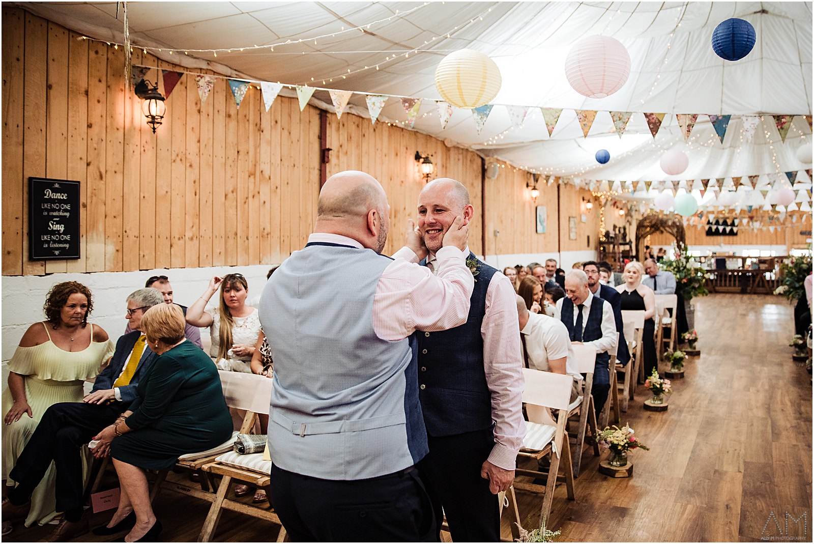 Best man grabs grooms face