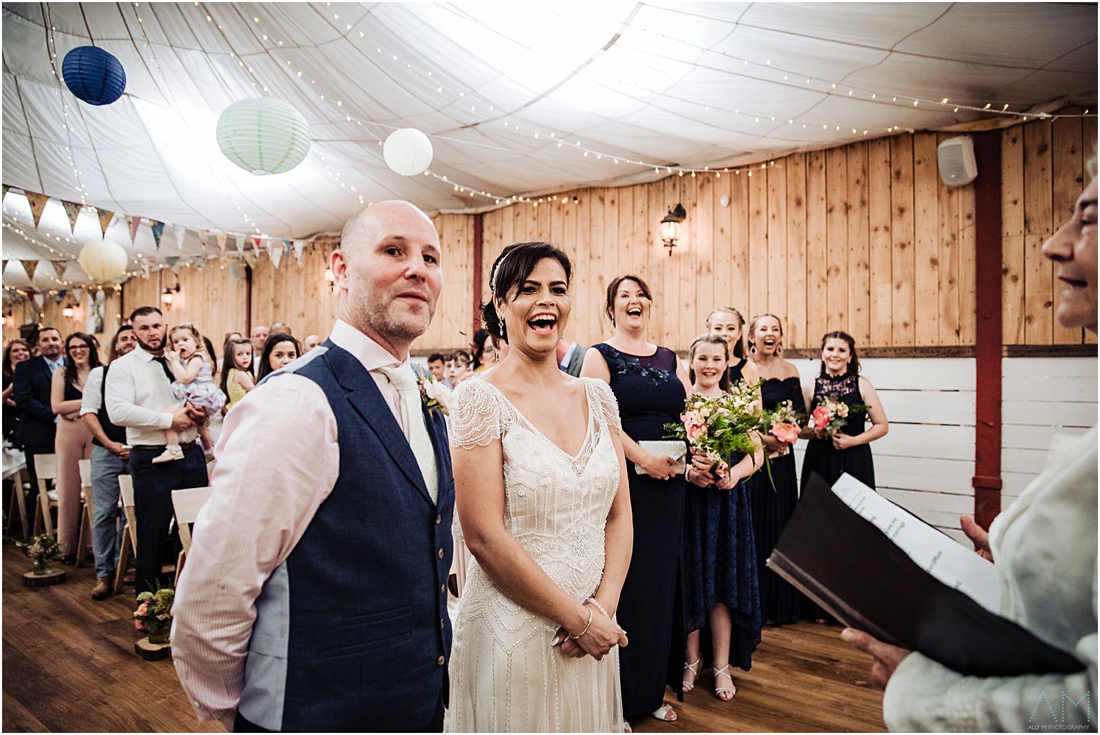 Bride and groom laughing at Wellbeing farm