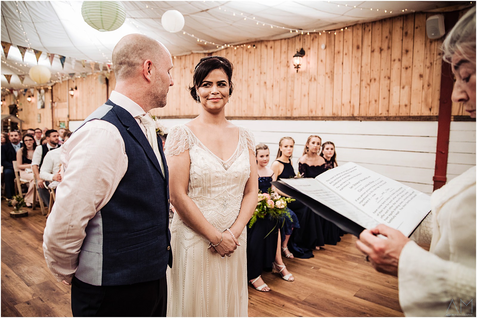 Bride smiling at the groom