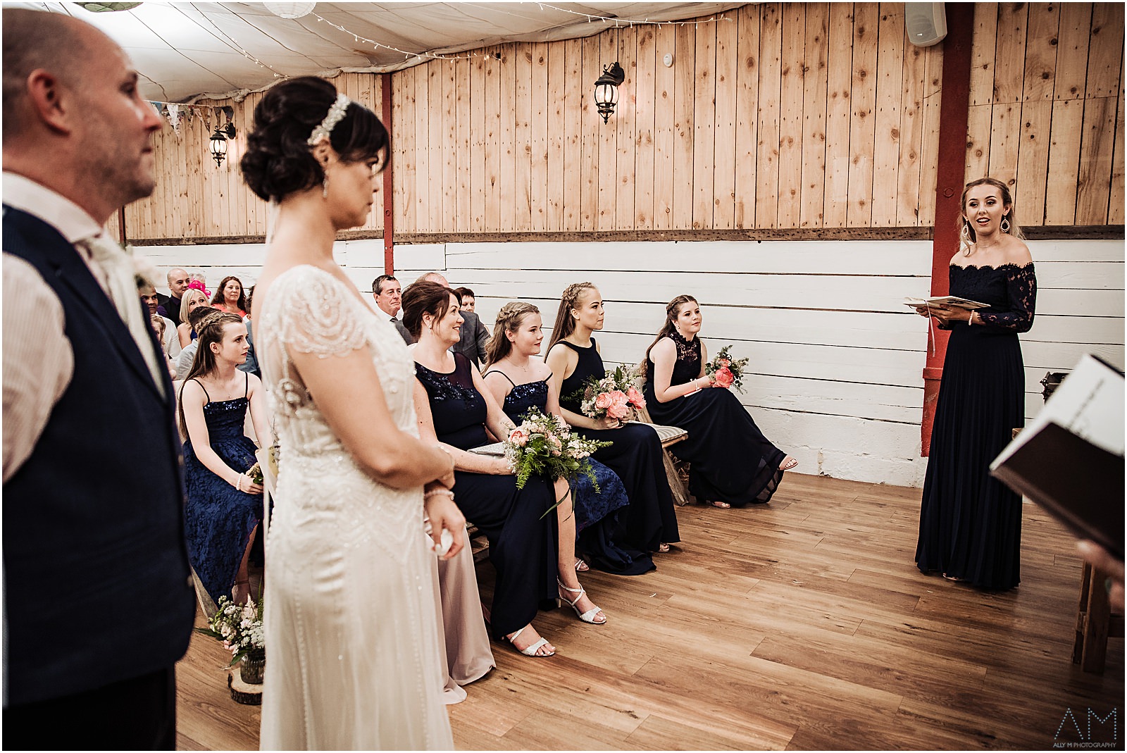 grooms daughter gives a reading during the ceremony
