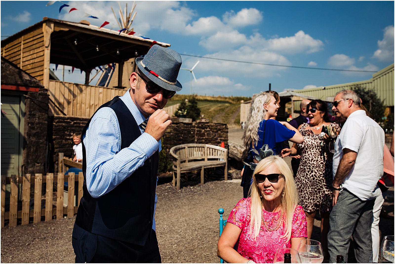 Wedding guest wearing a funny hat