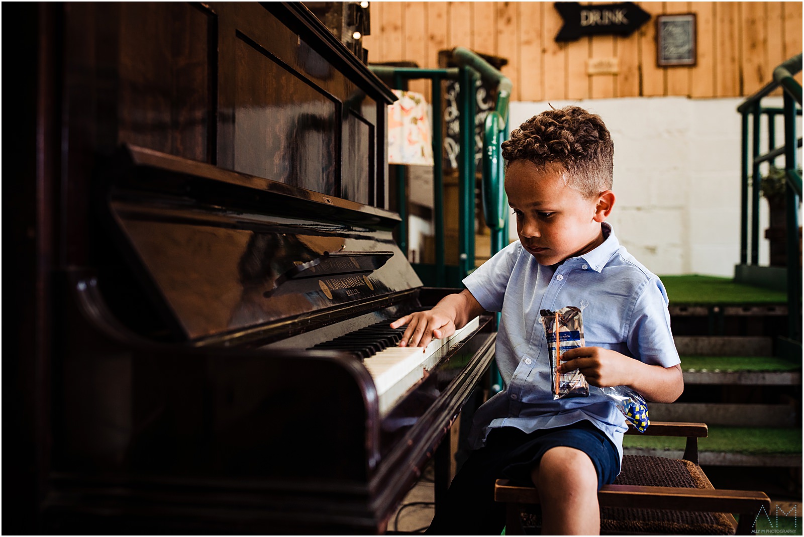 little boy on a piano
