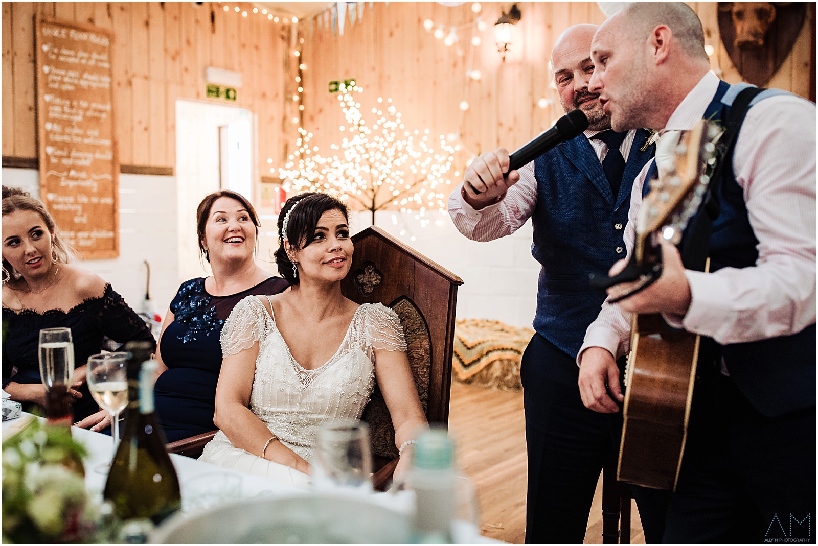 Groom singing the the bride at the wellbeing farm