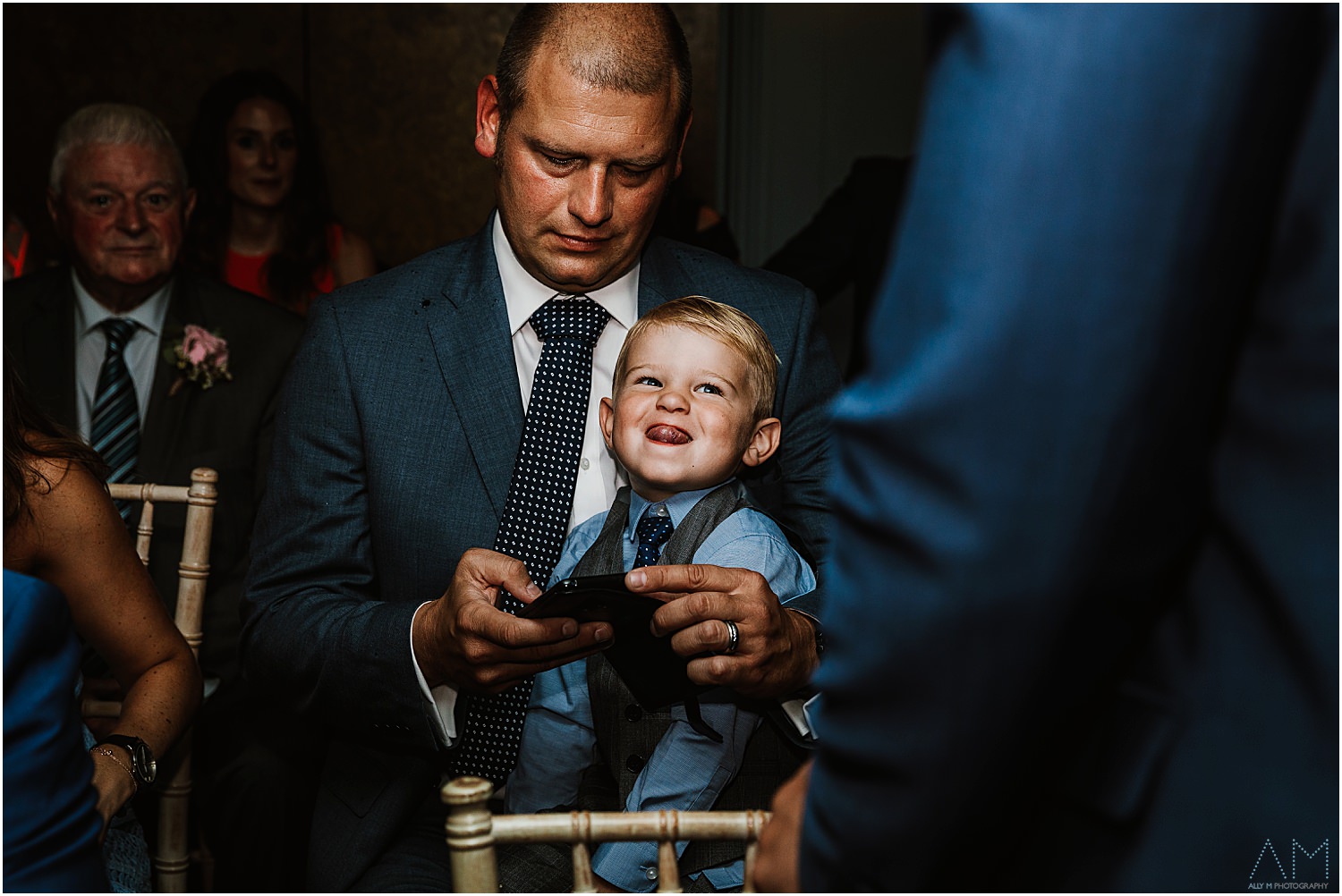 Little boy pulling his face