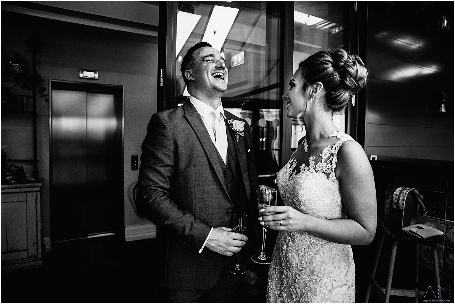 Groom laughing with his bride