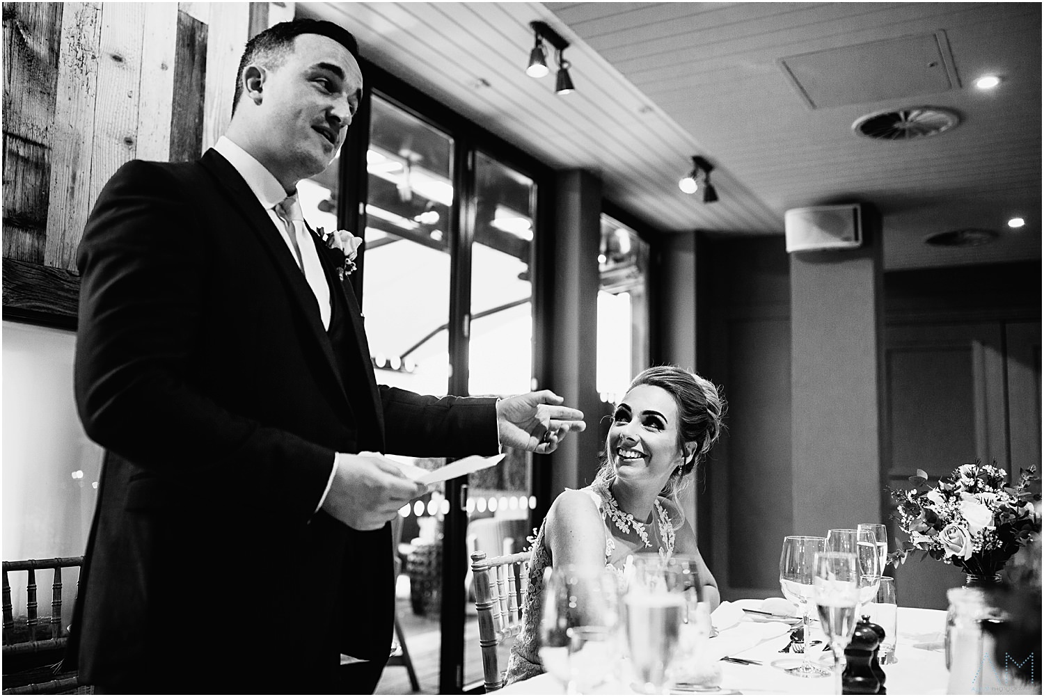 Bride smiling during speeches