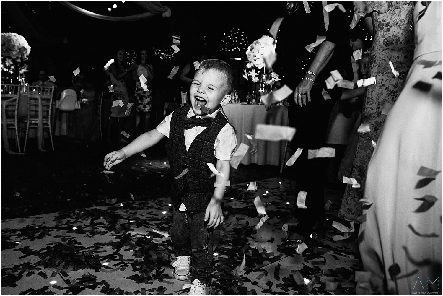 Little boy playing in the confetti
