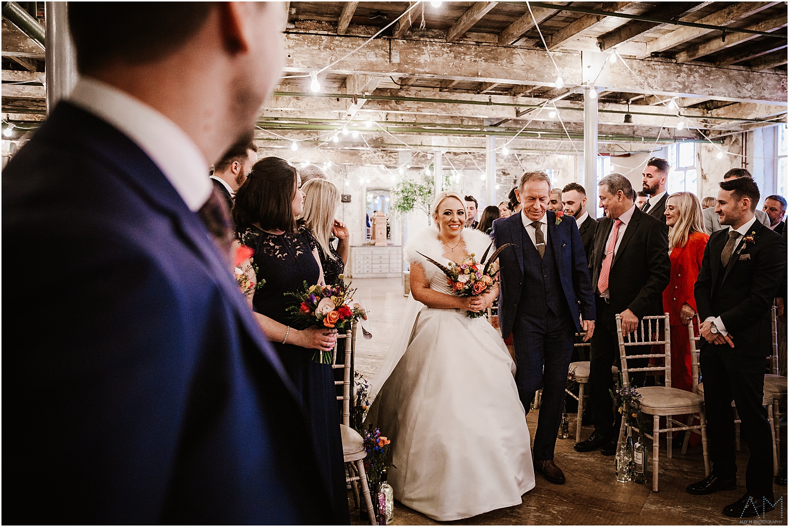 Holmes Mill Wedding | Gabby & Paul 15 Bride walking down the aisle at Holmes Mill