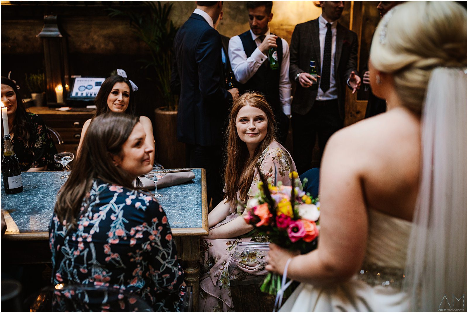 Holmes Mill Wedding | Gabby & Paul 23 Wedding guests smiling with the bride