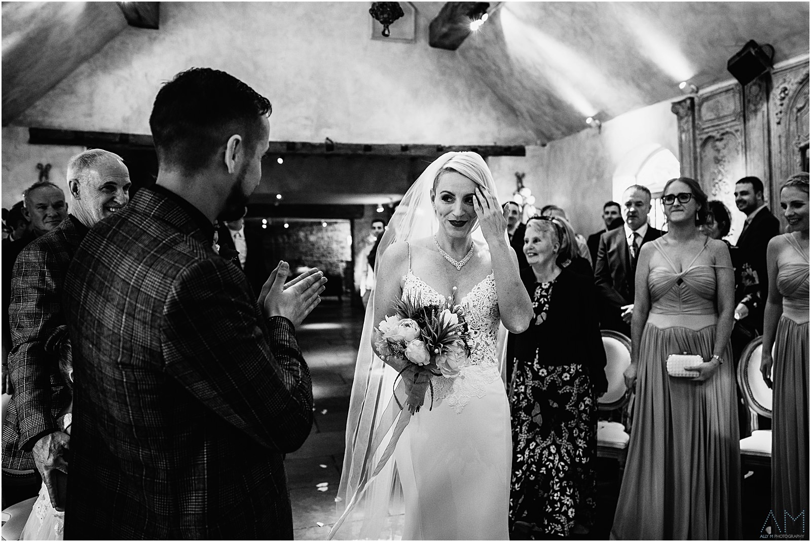 Bride walking down the aisle at Le Petit Chateau