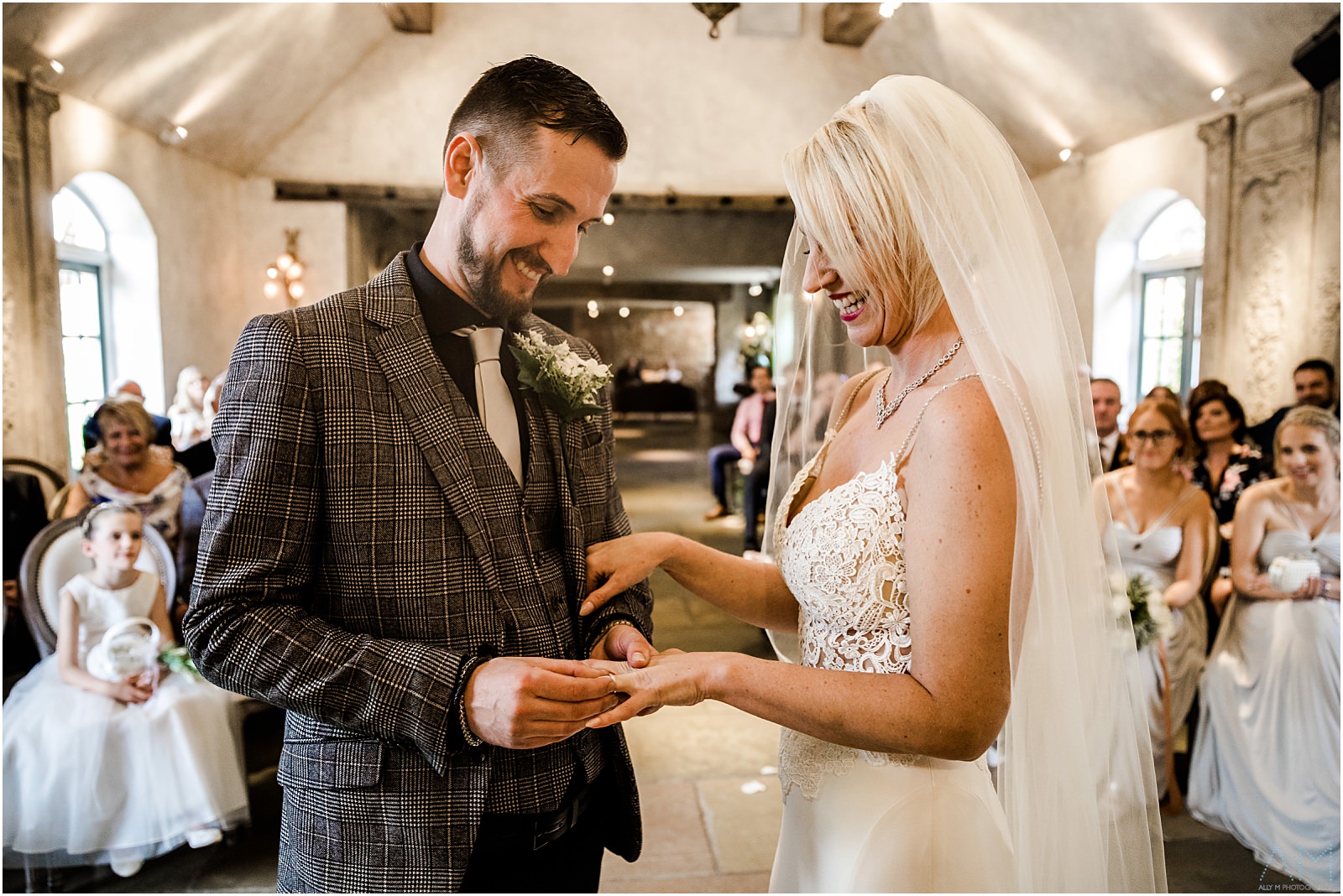 Bride and groom exhanging rings