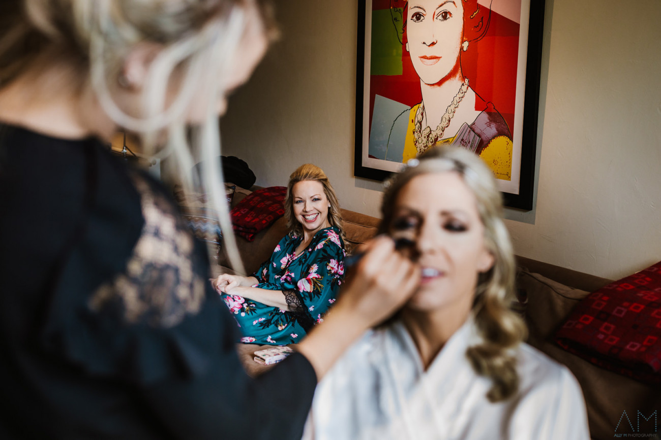 Smiling bridesmaid during bridal preparations