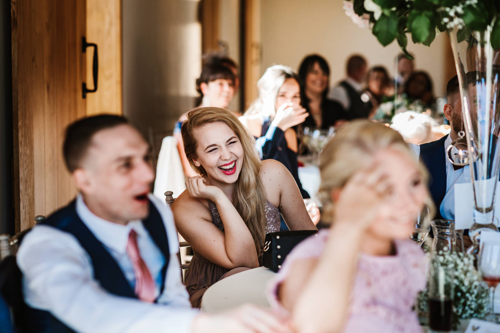 Guest laughing during speeches