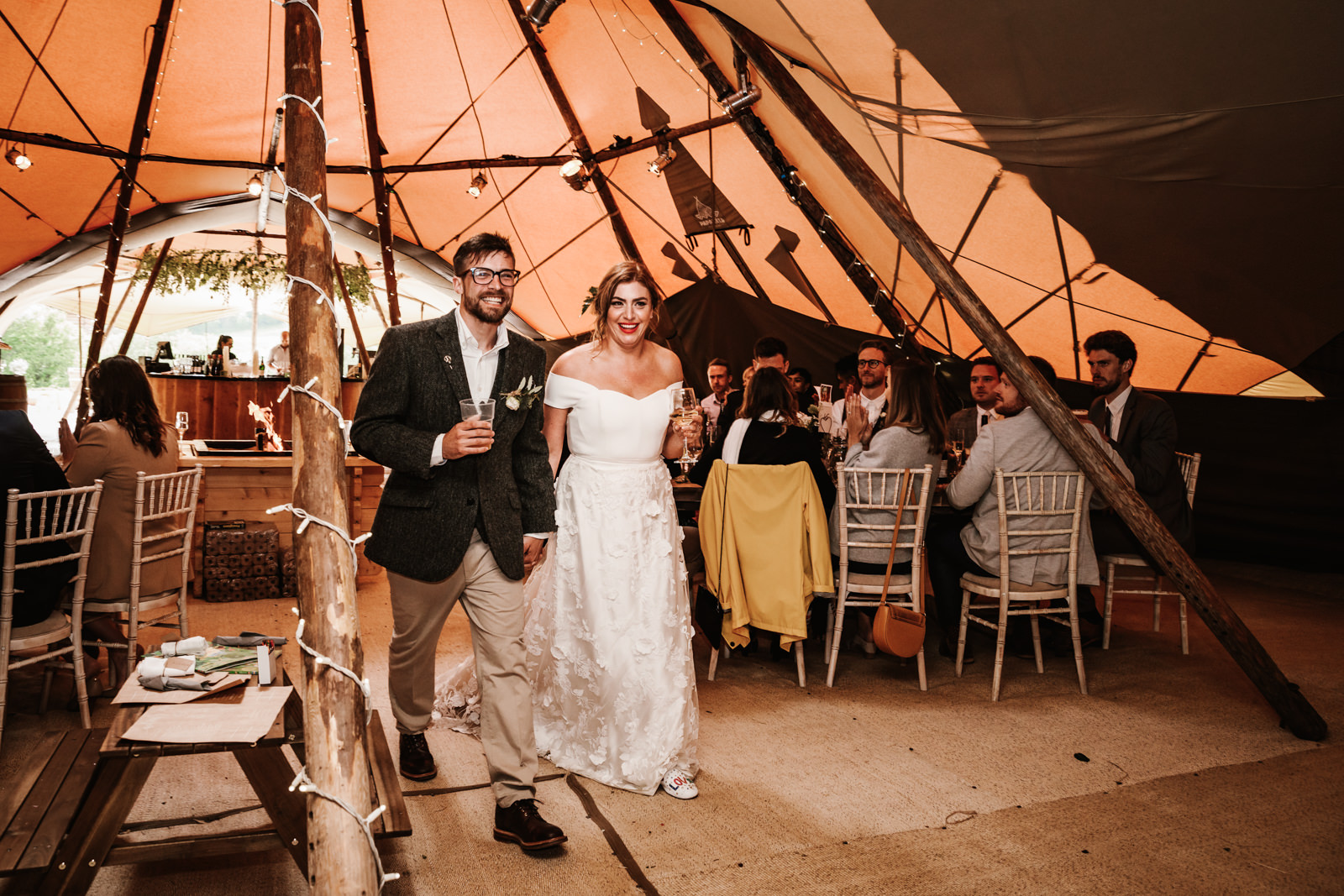 Bride and groom enter the tipi