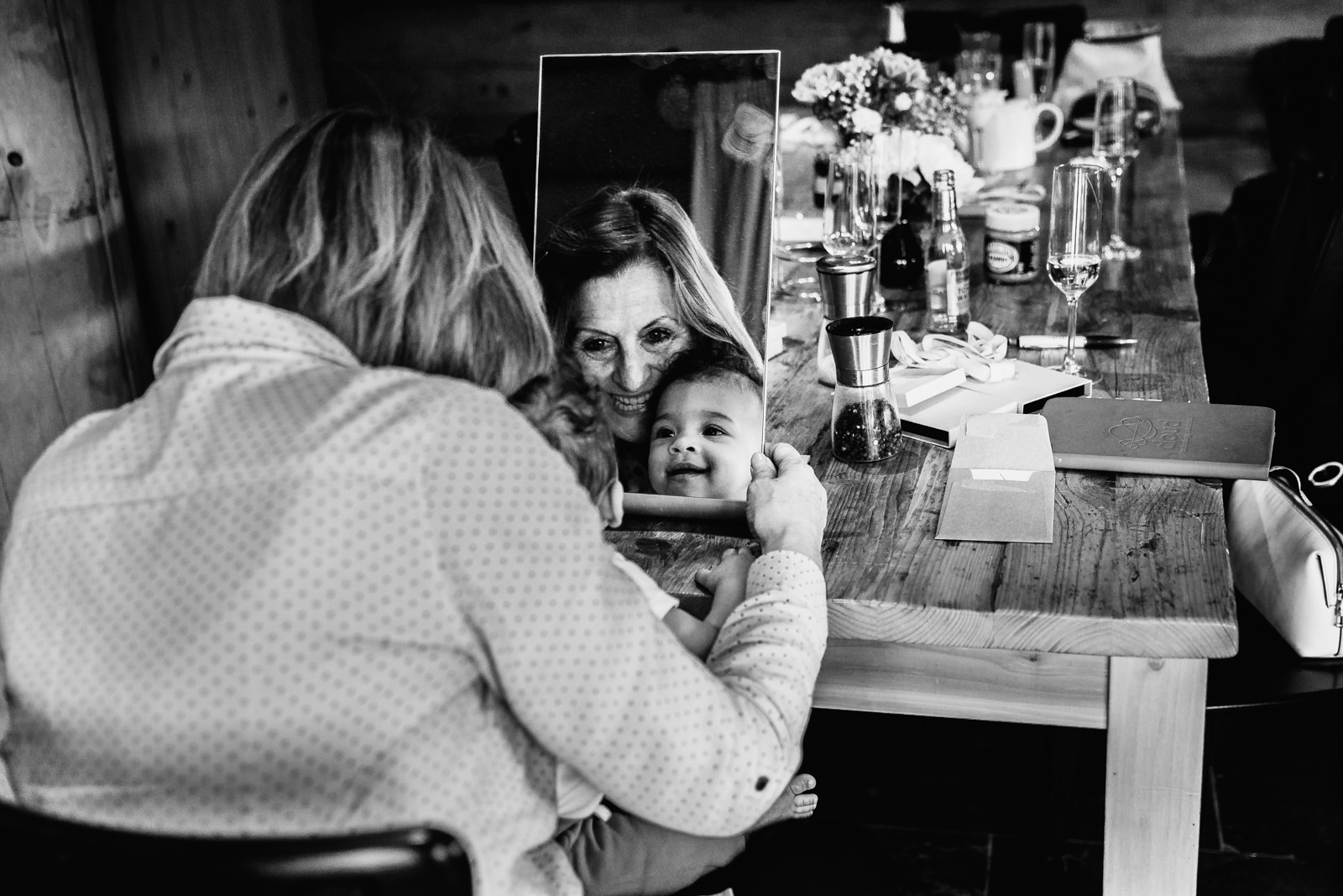Little girl and grandma looking in the mirror