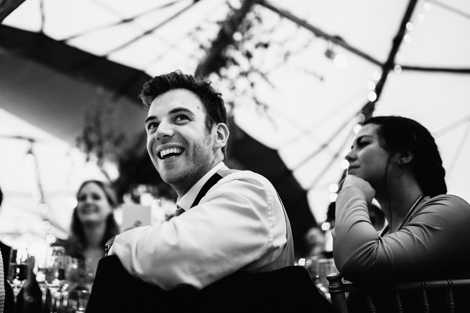Guest laughing during the speeches