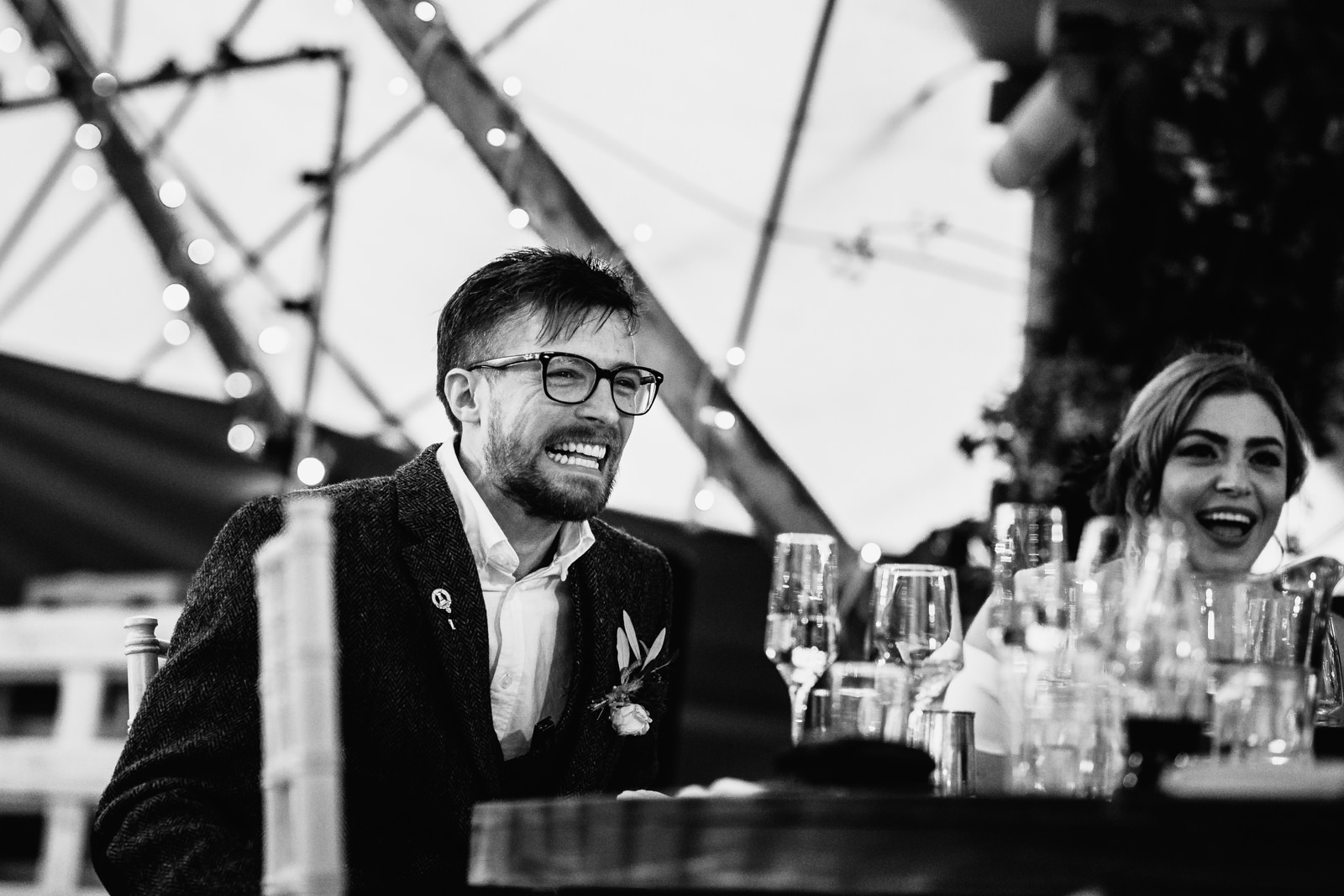 Groom laughing