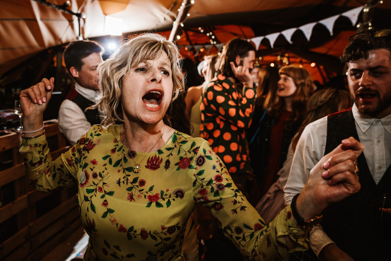 Mother of the bride singing on the dance floor