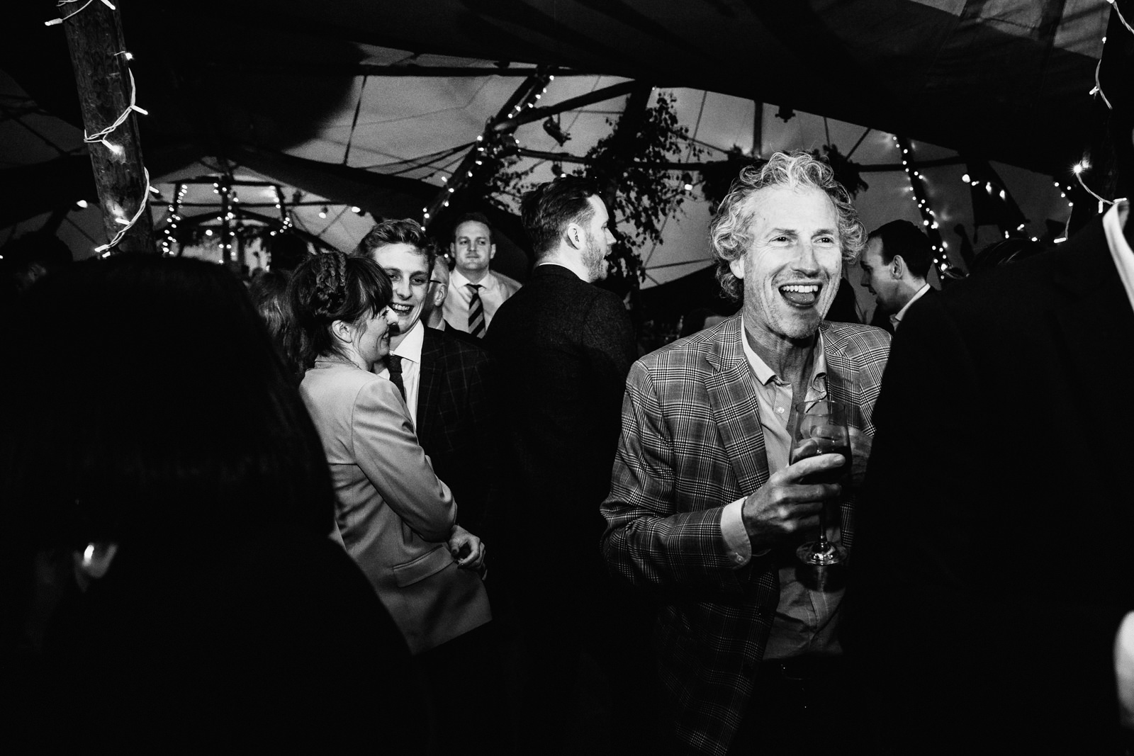 wedding guests pack the dance floor