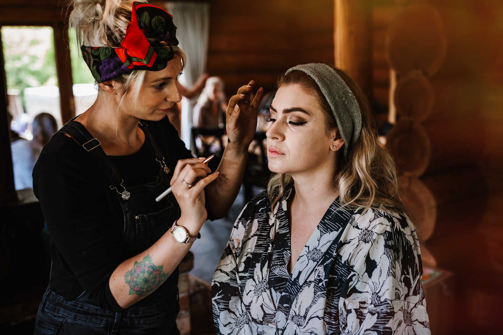 Bride having her makeup applied