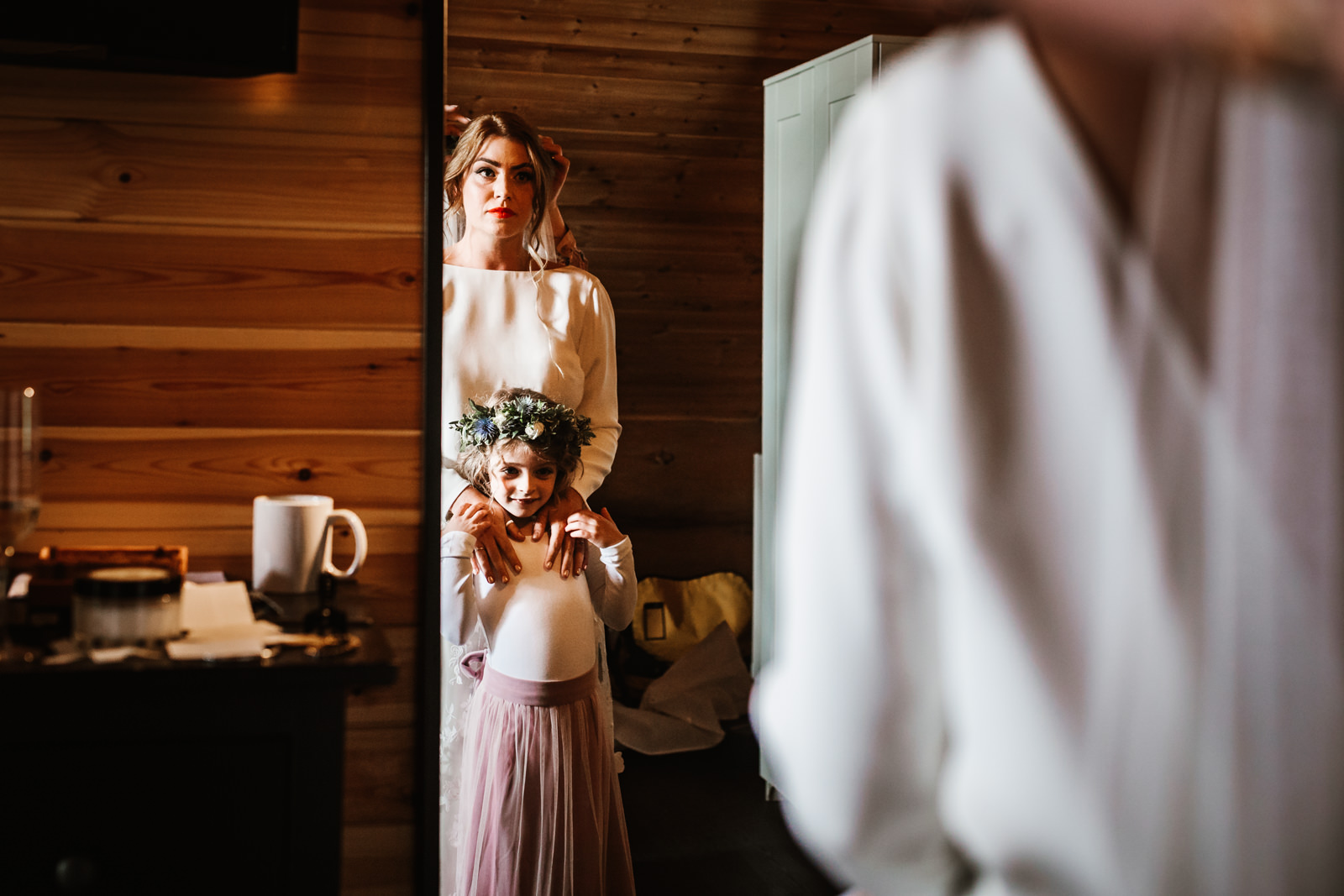 Bride and her daughter looking in the mirror