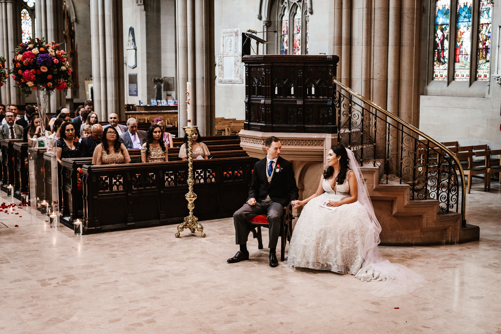 Bride and groom sat in church