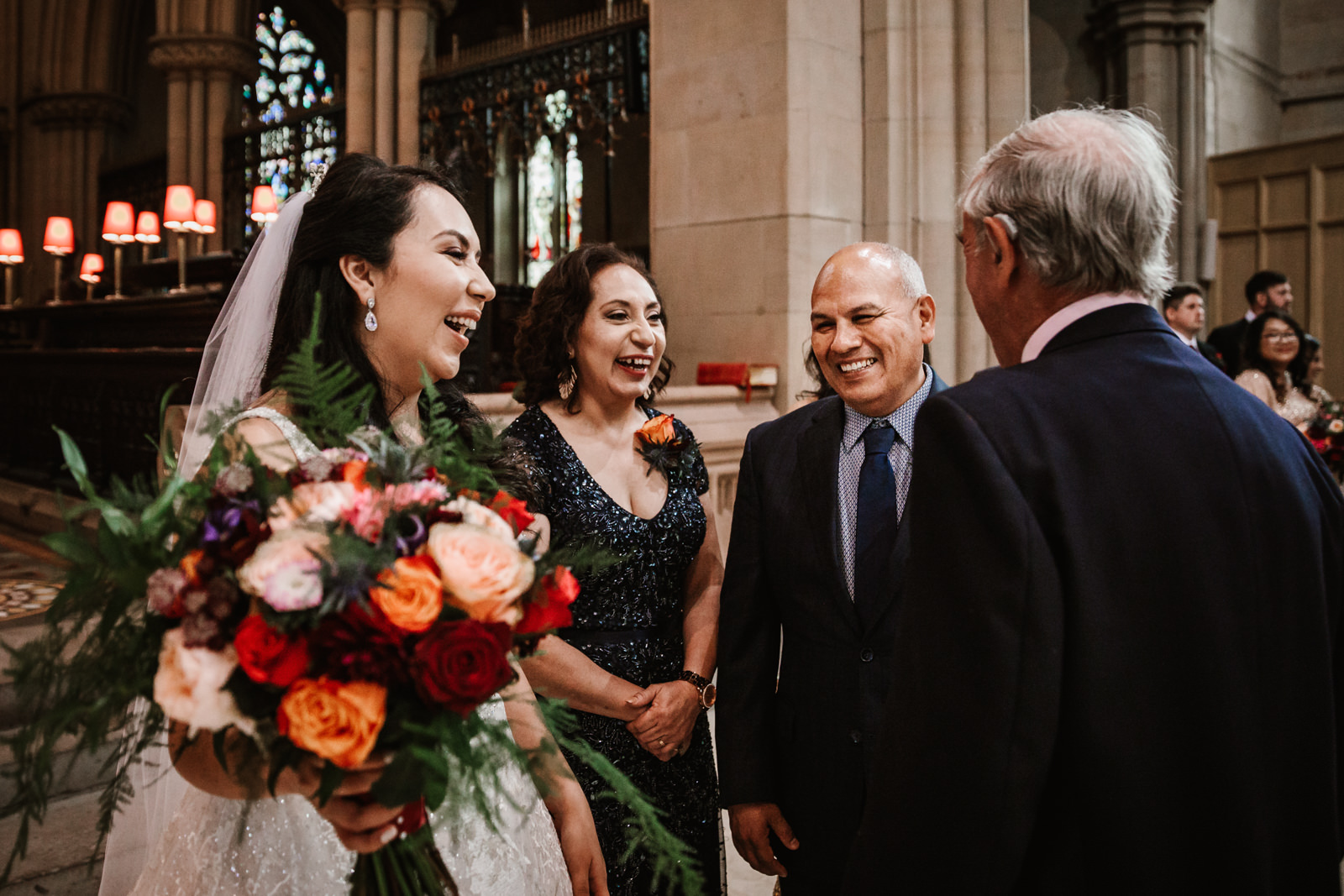 Bride and groom with parents