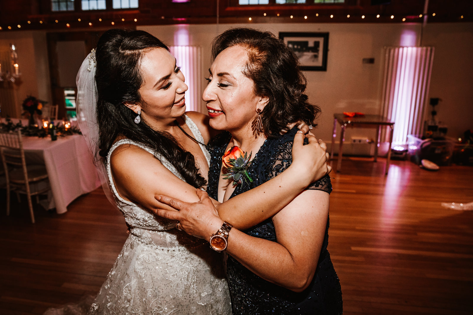 Bride dancing with her mother