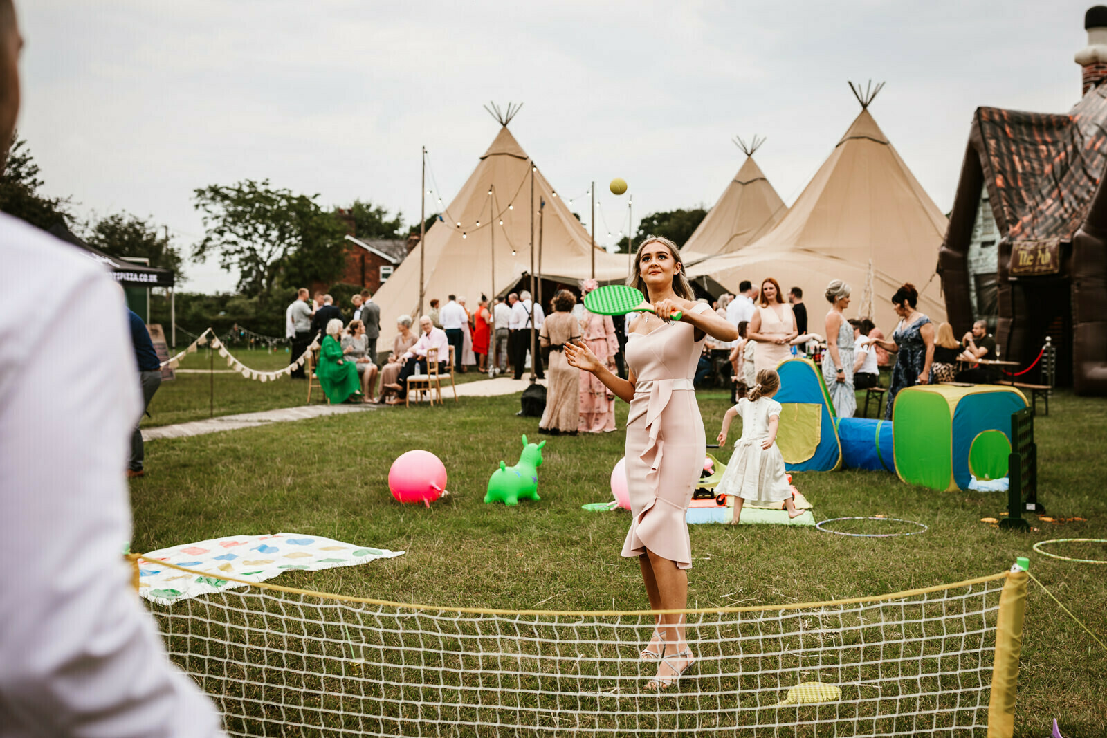 Lester Meadows Tipi Wedding Cheshire 62 Playing badminton