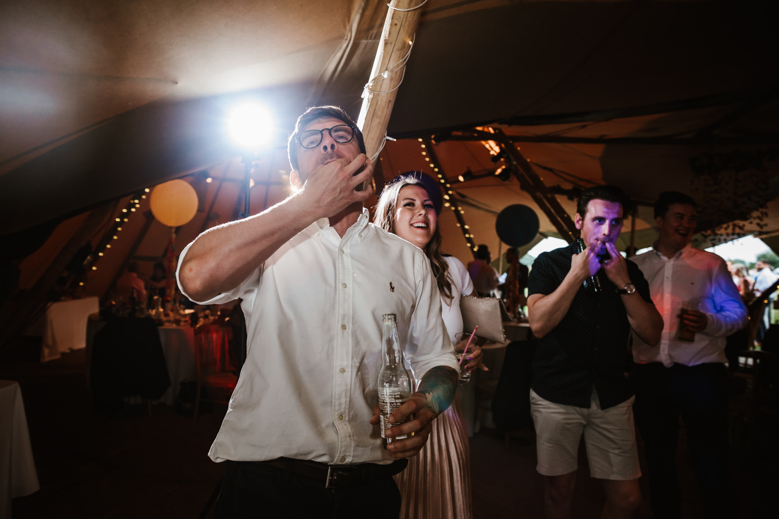 Lester Meadows Tipi Wedding Cheshire 70 Man whistling