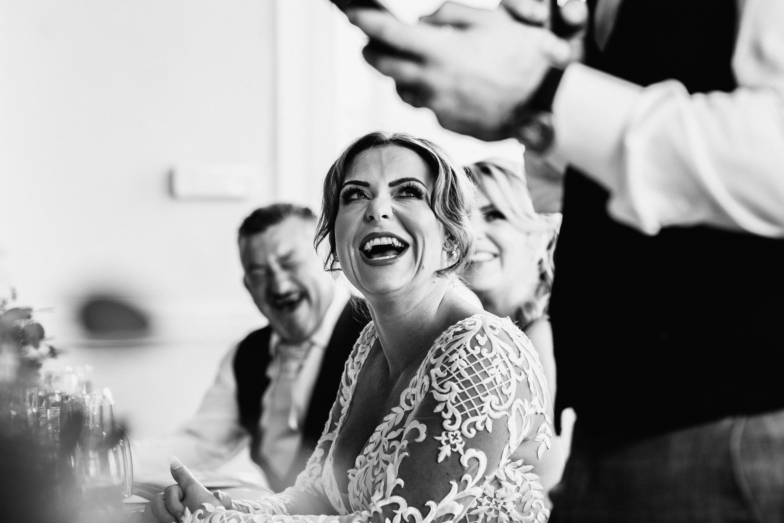 Lakeside Wedding At The Belsfield Hotel 31 Bride laughing during the speeches