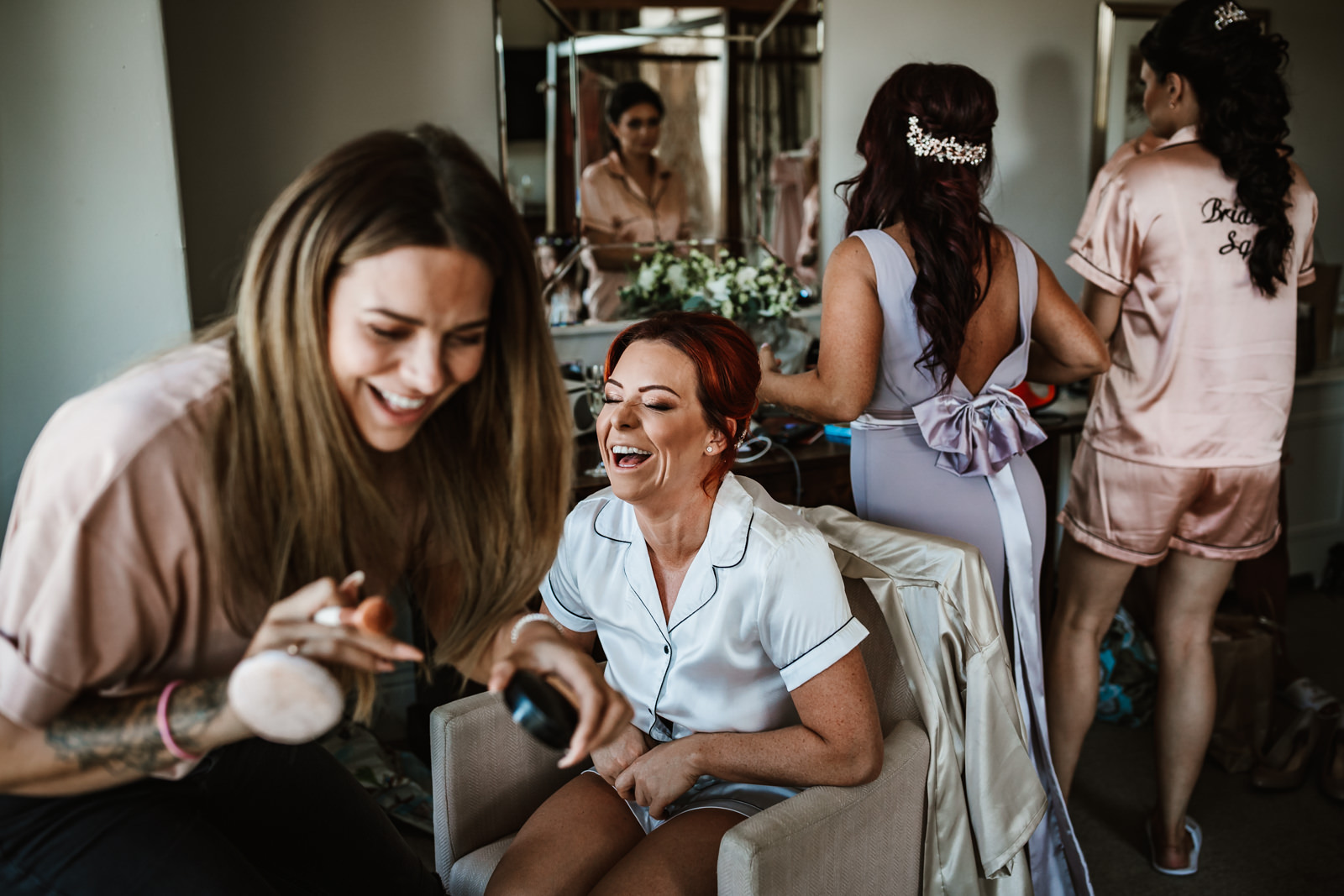 Lakeside Wedding At The Belsfield Hotel 10 Laughing during prep