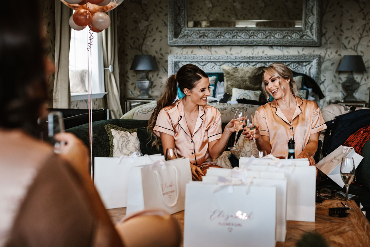 Bridesmaids with prosecco. cheers