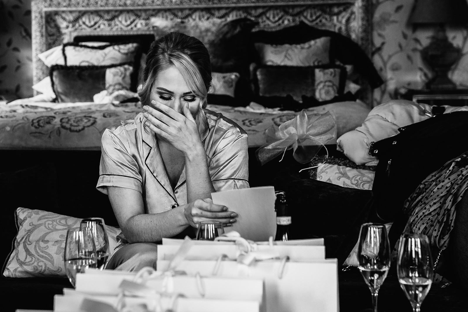 Emotional bridesmaid receiving a gift