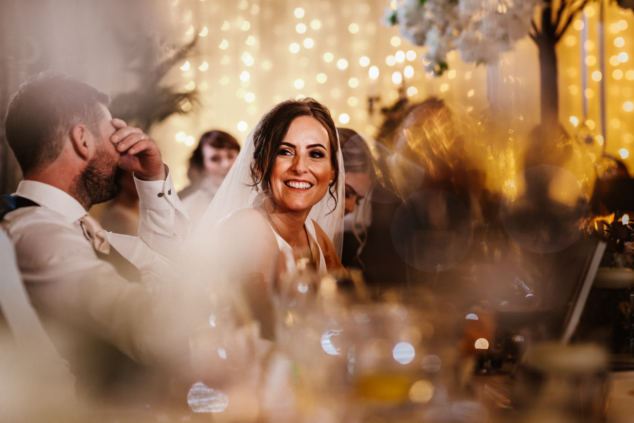 Bride during the speeches at eaves hall