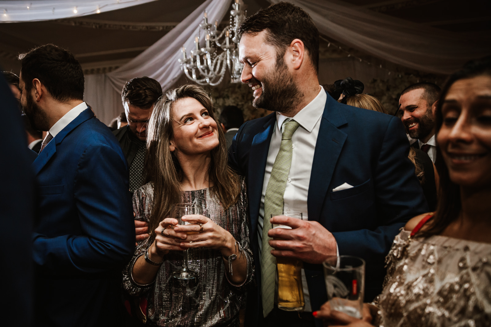 Happy wedding guests at Eaves Hall