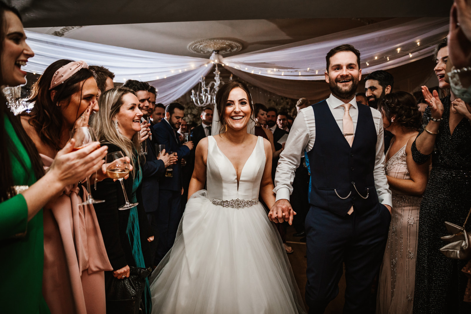 Bride and Groom enter main room at Eaves Hall