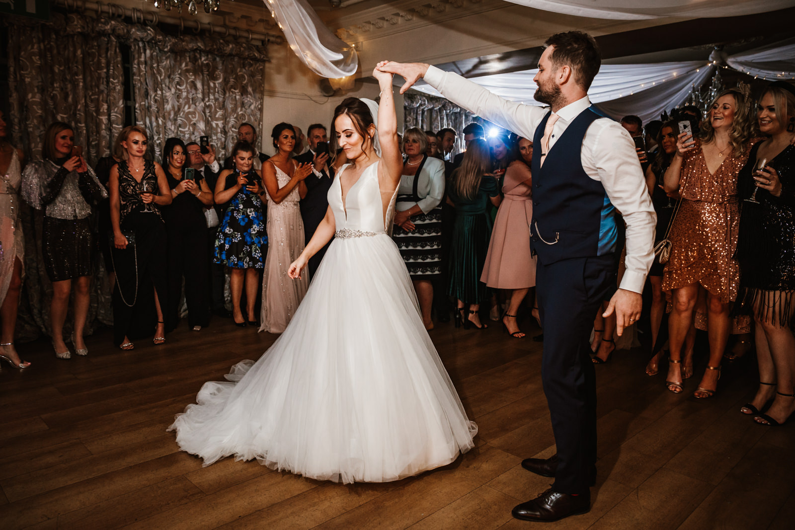 bride and groom dancing