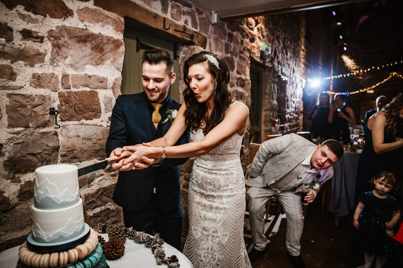 Cutting the cake at The Ashes Barns