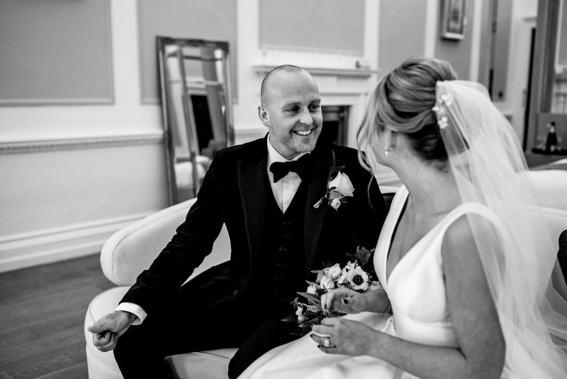 Groom smiling at his new bride