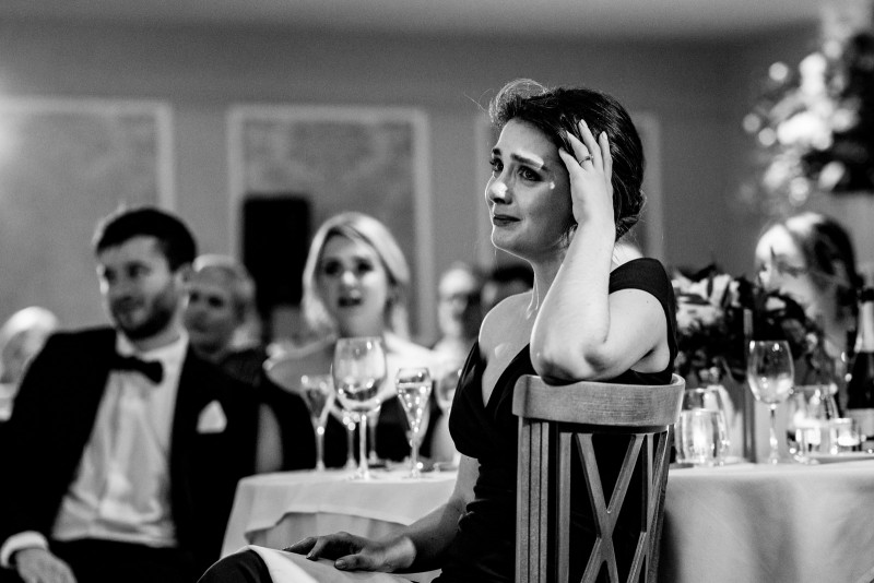 Bridesmaid crying during speeches at Old Palace Chester