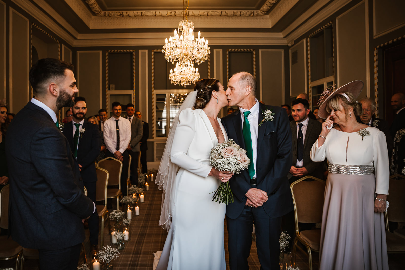 Bride kissing her dad at Manchester hall