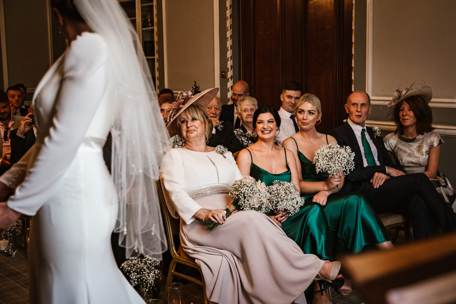 Wedding guests looking on during the wedding ceremony at Manchester hall